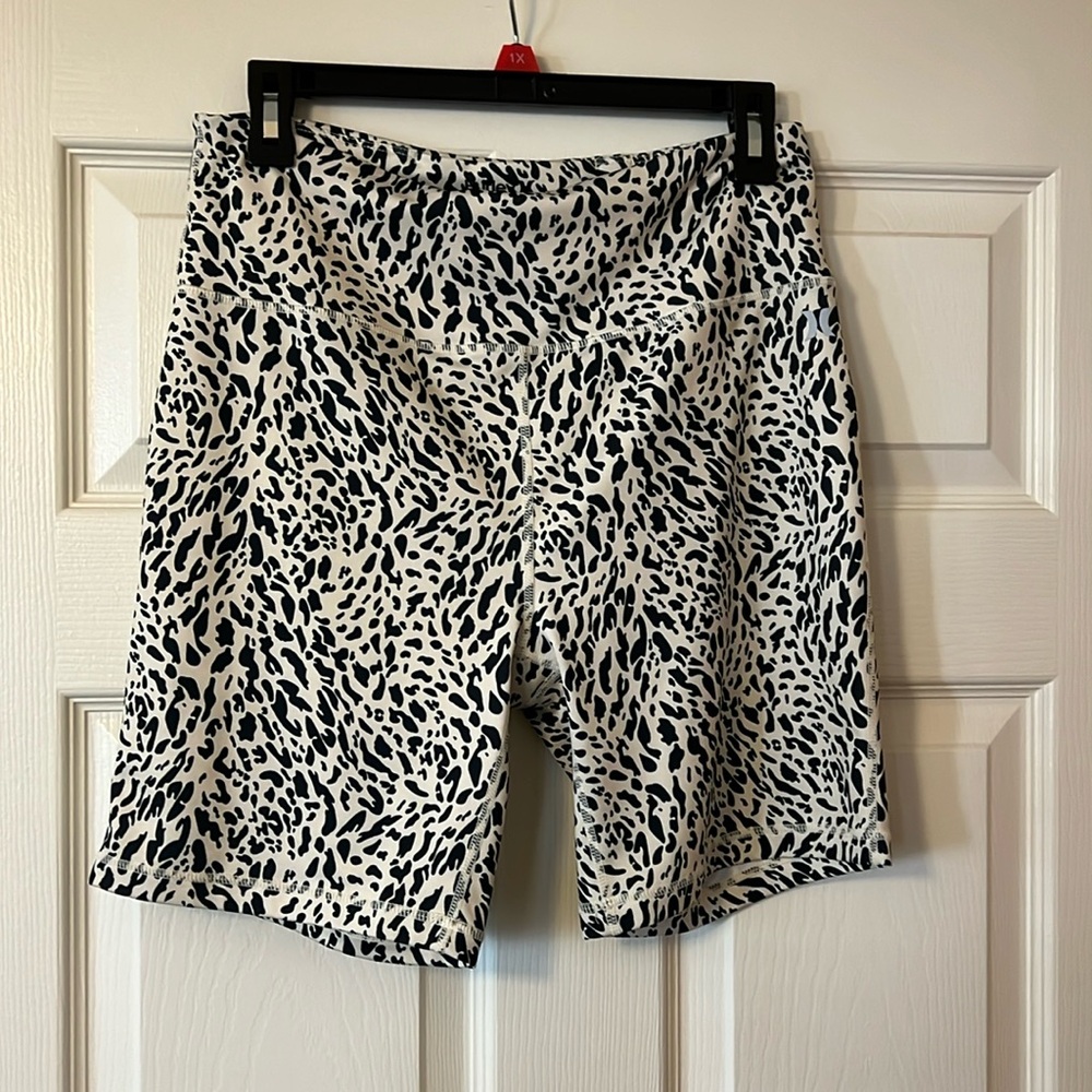 Hurley biker shorts, Size L. Has leopard print design.